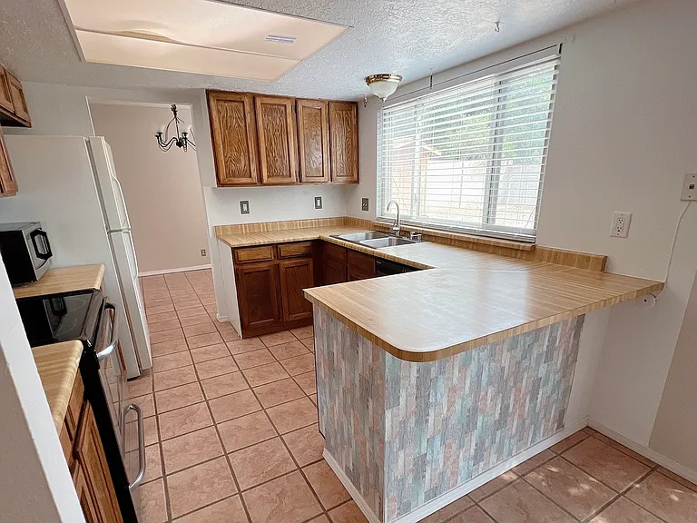 7304 Christy Ave NE — Photo 12