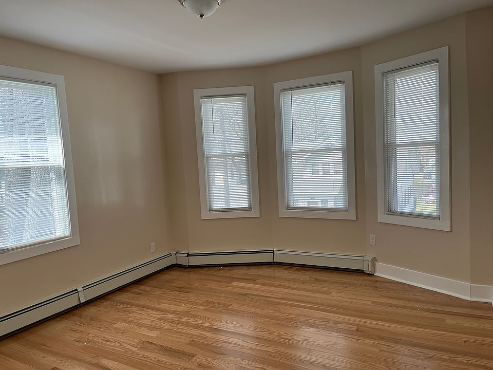 Spacious living room, Thermal windows, gorgeous hardwood floors.