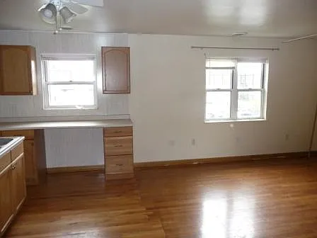 Open concept, oak cabinets and counter space for 2 people to eat or use as an office space with computer. This apartment is equipped with plenty of outlets and access to cable and computer hook ups.