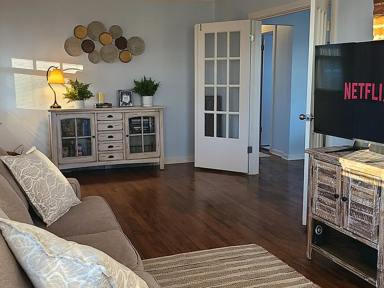 Living room, leading into dining room.