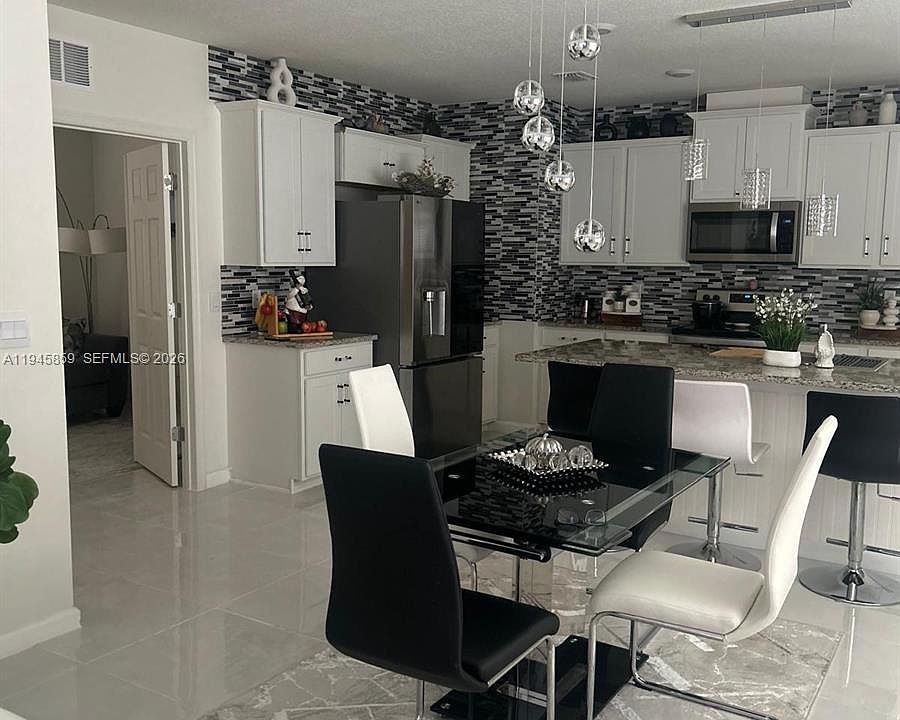 1st image of 12422 SW Rimini Way