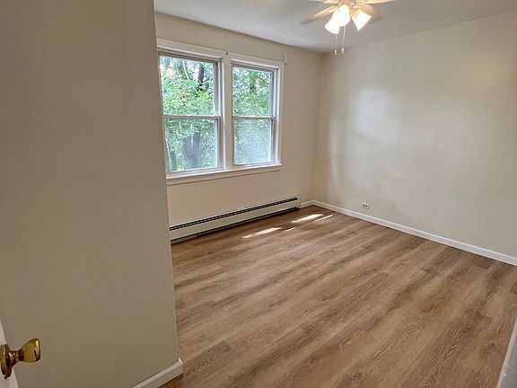Bedroom with half bathroom