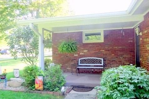 RELAX IN THE EVENING ON YOUR FRONT PORCH.  BENCH STAYS WITH HOME