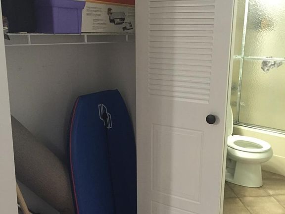 hall closet and guest bathroom