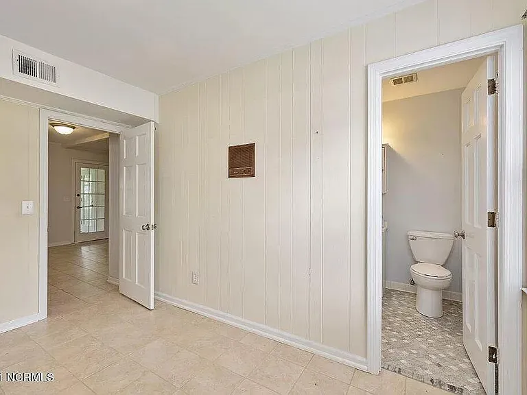 Storage room connected to half bath