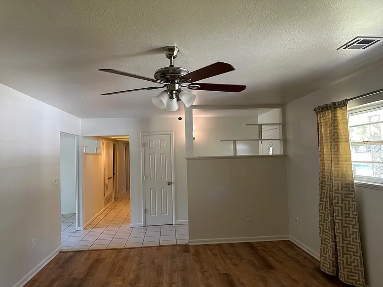 Living room with view into the hallway