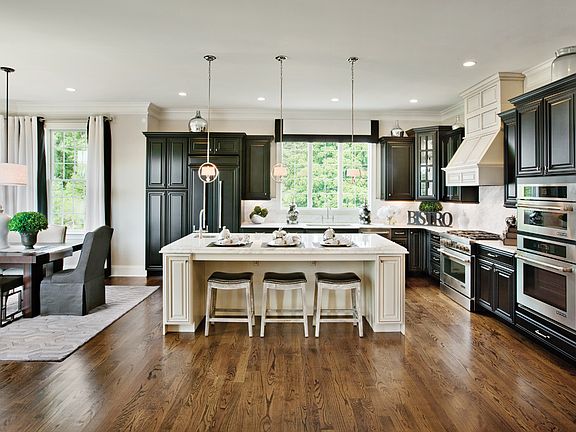 Gourmet kitchen with island and breakfast area