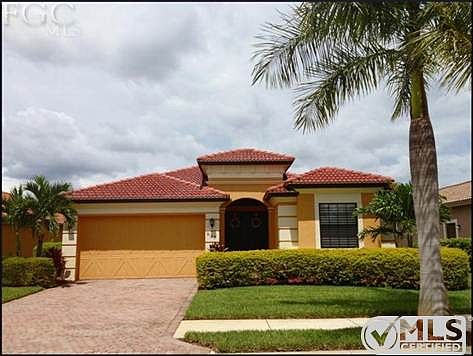This stunning & beautifully landscaped home makes a statement!