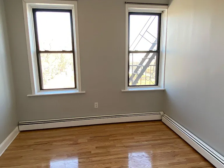 Bedroom # 2 with direct views of Riverview-Fisk Park, NYC skyline and Hoboken.