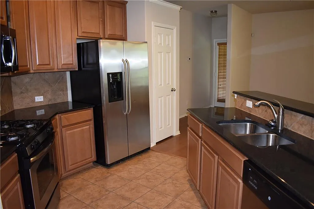 Building Photo - 1310 W Parmer Ln #1503