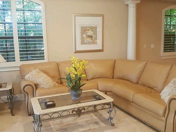 Great room tastefully decorated with Tommy Bahama furnishing