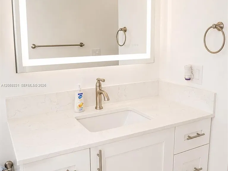 2750 W 76th St #203 — Photo 15