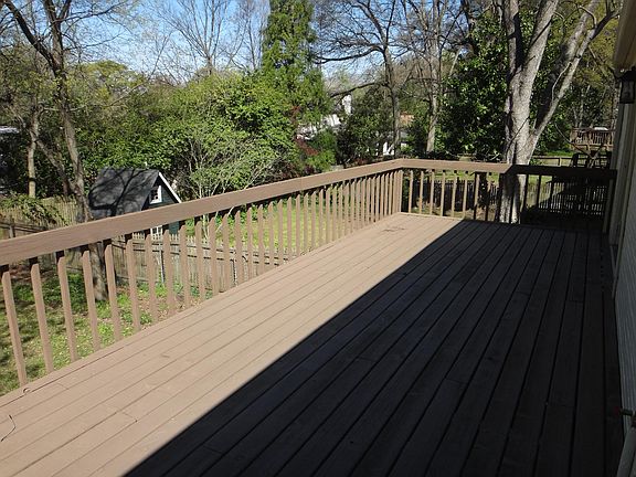 Large elevated deck space, spanning the rear of the property and overlooking the rear garden is accessed from bedroom.