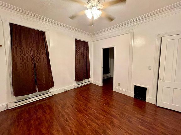 Master bedroom with attached office room and large walk in closet.