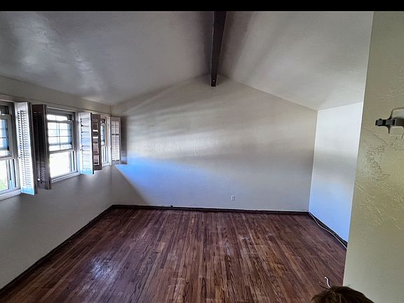 Large master bedroom with lots of
windows.