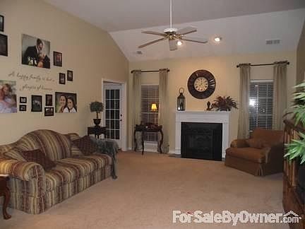 Famiily Room
						:
						11" vaulted ceiling with fireplace and gas logs