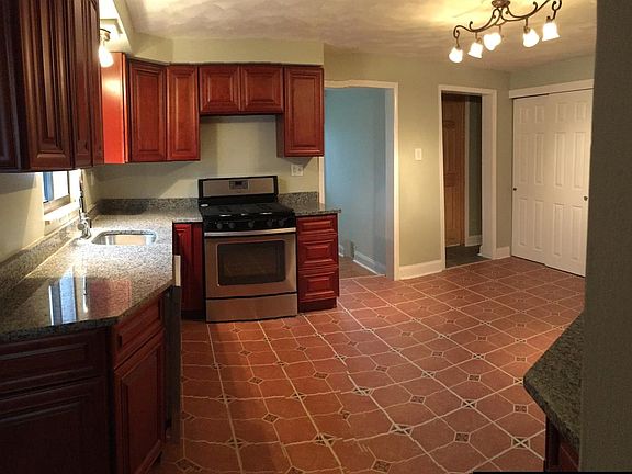 Kitchen - new appliances, cabinets, and tile!