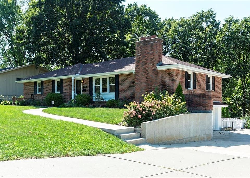 All brick home w/replacement windows & new drive & sidewalk