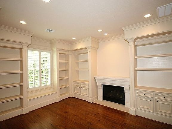 Study (16 x 14) The walls of bookshelves, fireplace, and private access to the