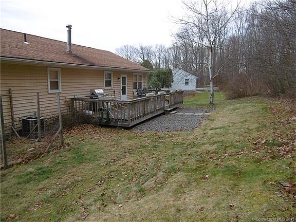 Rear view of property and y...