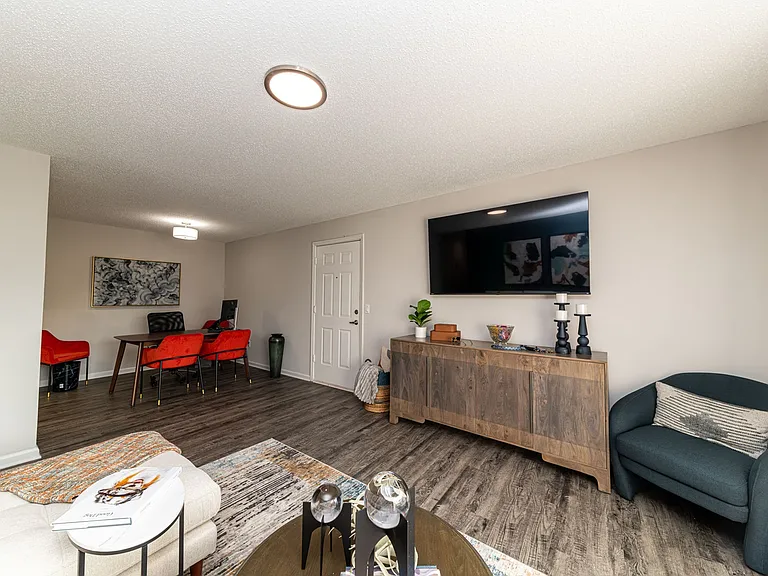 Spacious living room with hardwood-style flooring