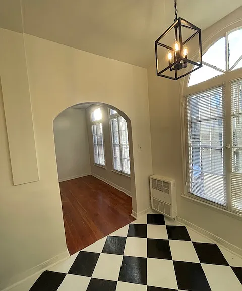 102 dining room with brand new floor and lighting