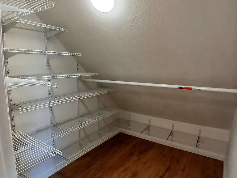 Upstairs walk-in closet