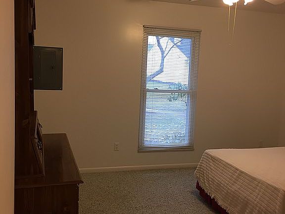 Bedroom next to full bath