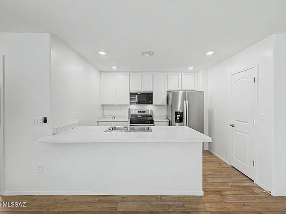 2nd image of 10561 W Waveland Dr