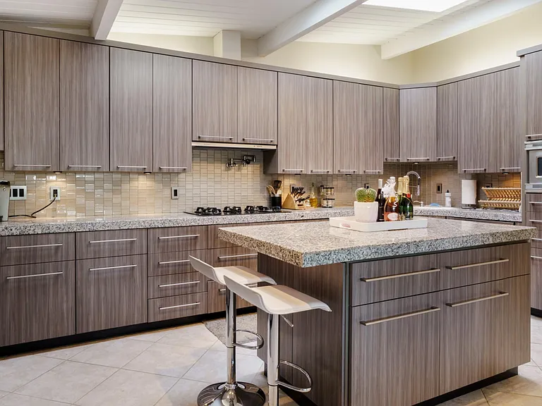 Kitchen with bar sink, wine cooler