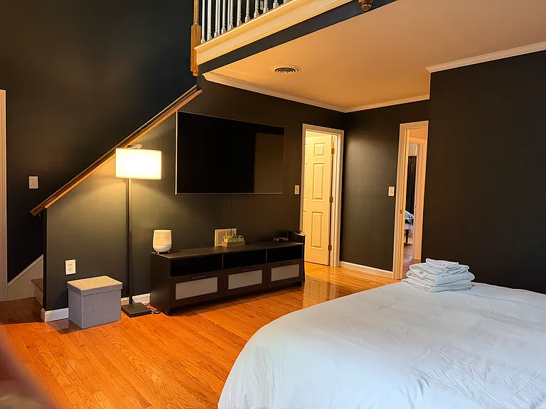 Main bedroom with ensuite bathroom and walk in closet.