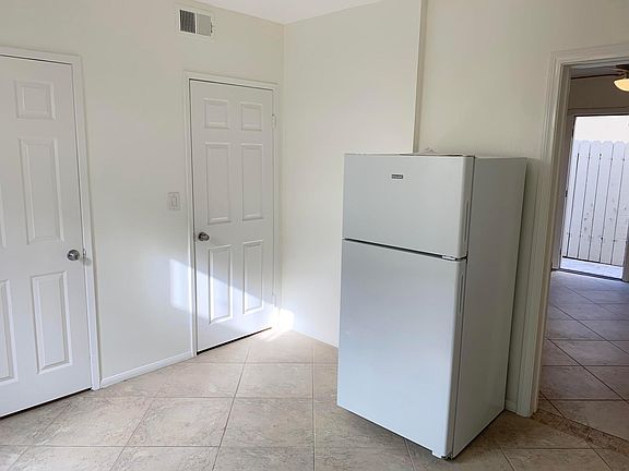 New fridge and large pantry closet.