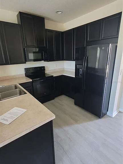 7005 Towering Spruce Dr — Photo 3