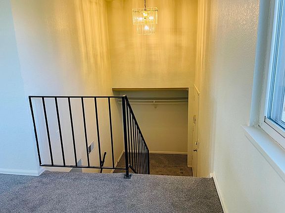 Freshly painted, brand new carpet. Big coat closet.