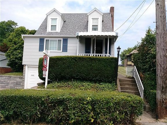 Newer roof, newer windows, two covered porches.