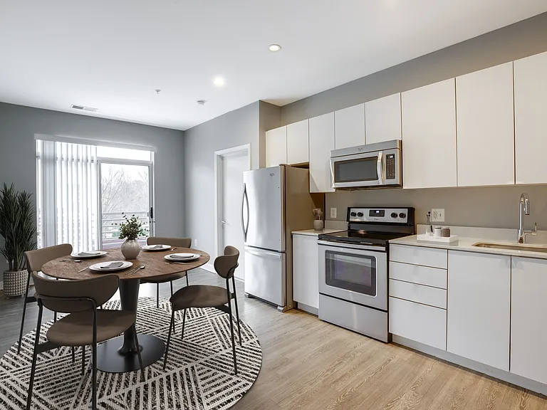 Kitchen and living area (virtually staged)