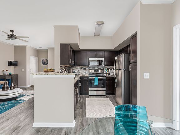 Open Kitchen and Living Room with Hardwood Floors - Oxmoor