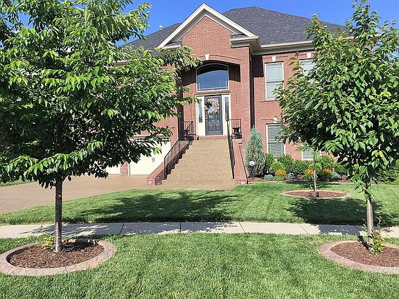 Arched brick entry and steps