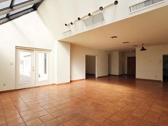 French doors lead to private walled terrace. Approximately 38 x 10