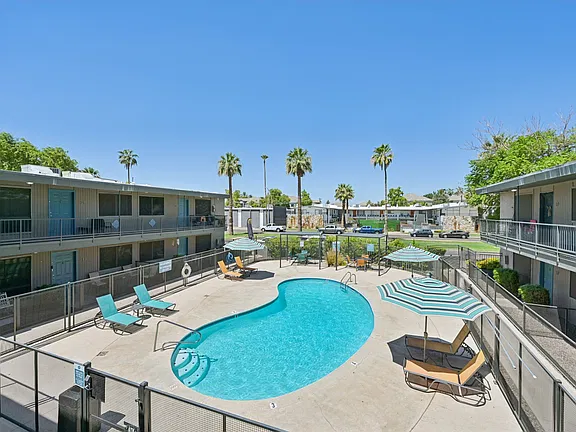 Pool and poolside area at Cornell Apartments.