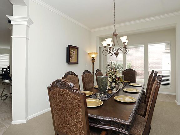 Spacious dining room located off the foyer with great windows and architectural details.