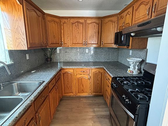 Kitchen - refrigerator and stove included.