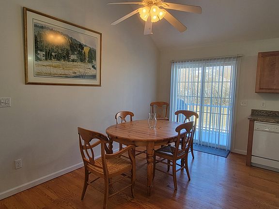 Eat in kitchen area with sliders to small deck.
