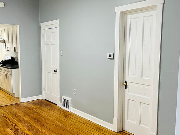 Bedroom 1 has a walk-in closet room on the side.