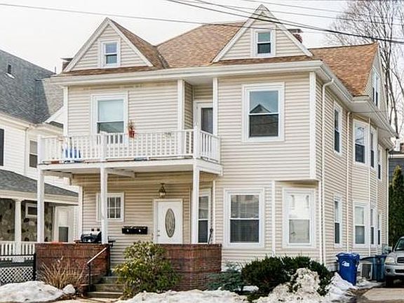 Front view of the house. Unit 2 Is level 2 and 3