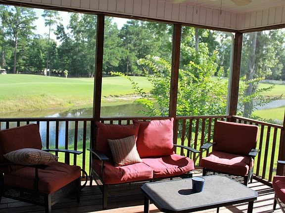 Screened back porch view