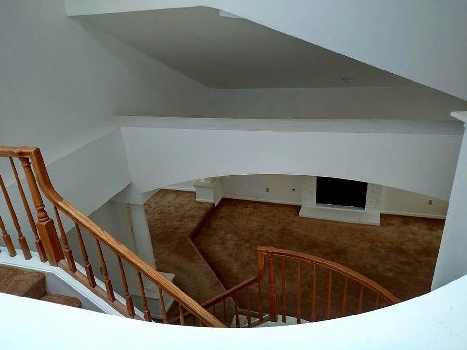 VIEW OF LIVING ROOM FROM STAIRCASE
