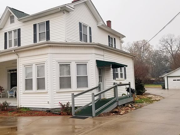 Side of home, entry, and ramp