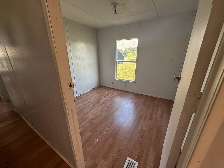Second bedroom. New flooring and paint.