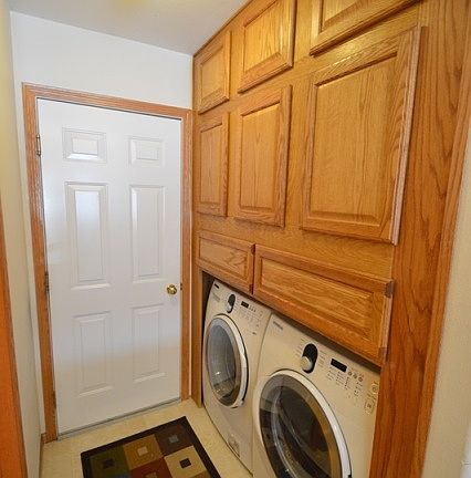 New built-ins add tons of extra storage in laundry area.